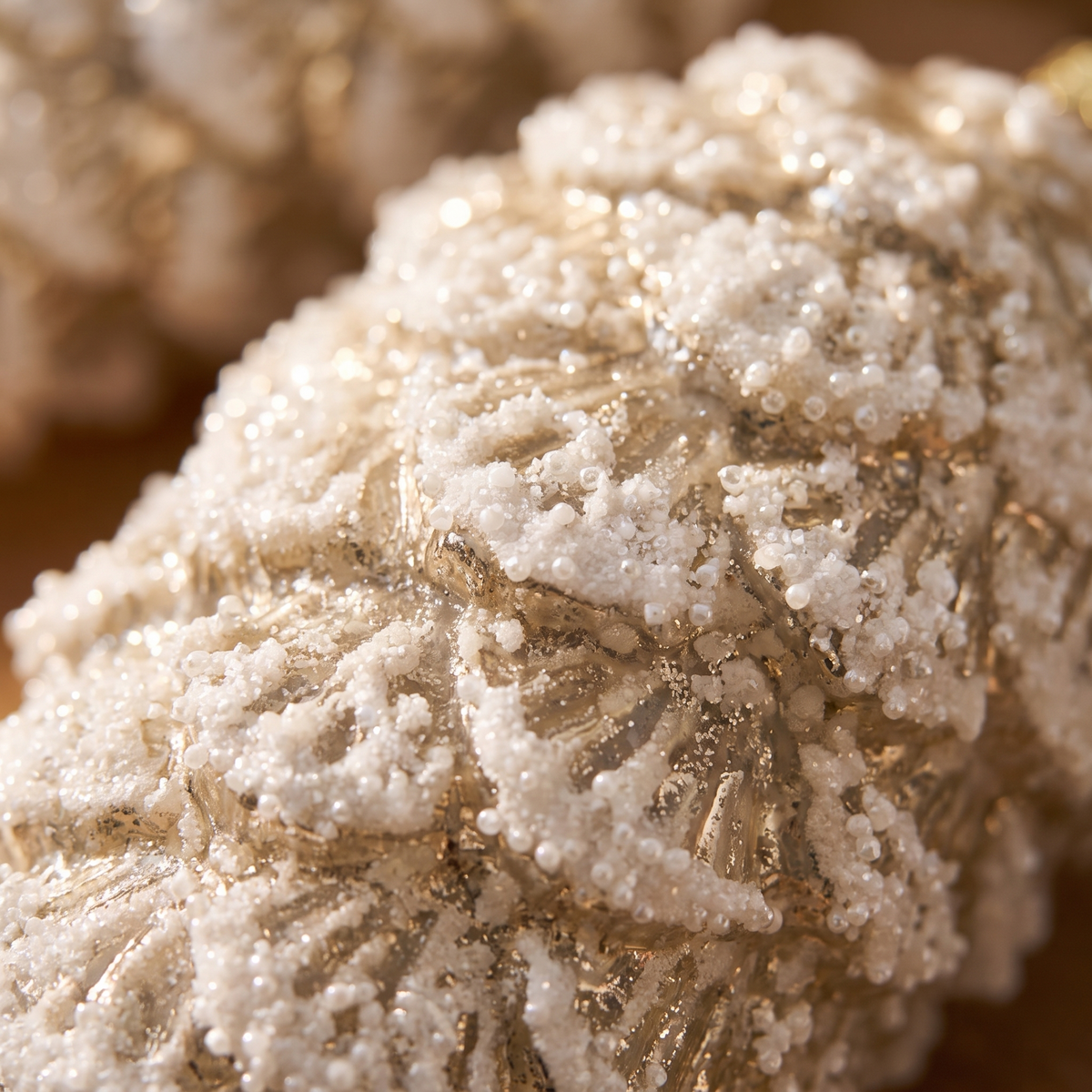 Champagne Gold Glass Pinecone Christmas Baubles – Set of 2 – close-up of the finish and texture