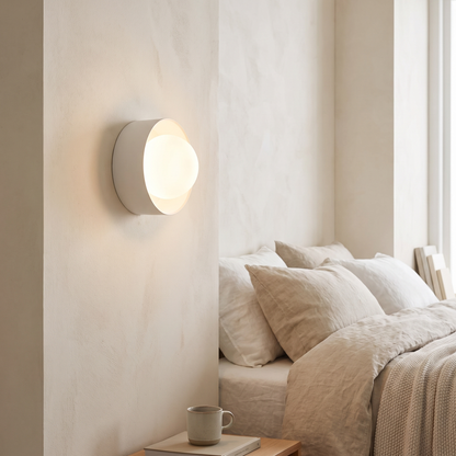 Orb Framed Glass Wall Light – White – styled in a room