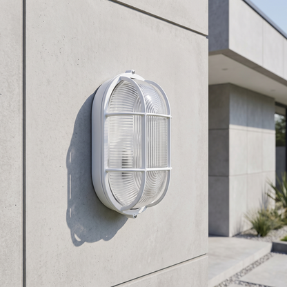 Oval Caged Bunker Light – mounted outdoors in daylight