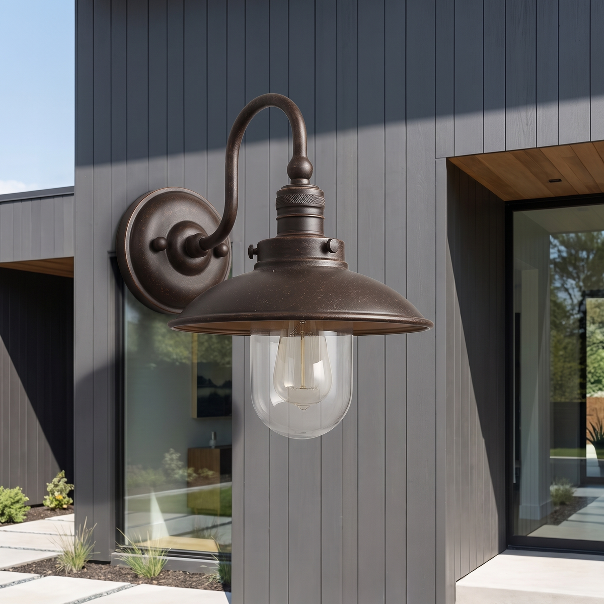 Vintage Gooseneck Wall Light – Antique Bronze – mounted outdoors in daylight