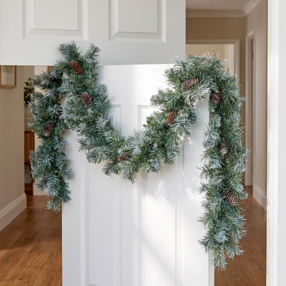 Frosted Blue Spruce Christmas Garland with Pinecones – 2.7m – styled in a room