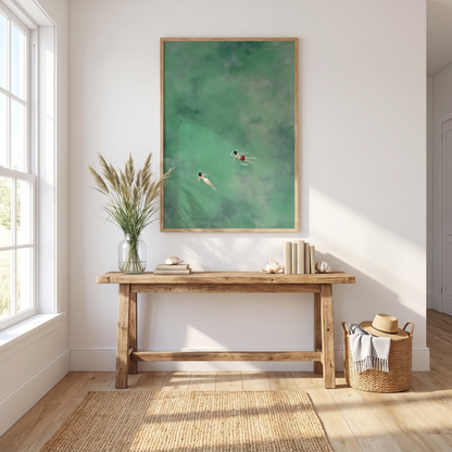 Green Ocean Swimmers Aerial Coastal Print – Framed Wall Art – styled in a room