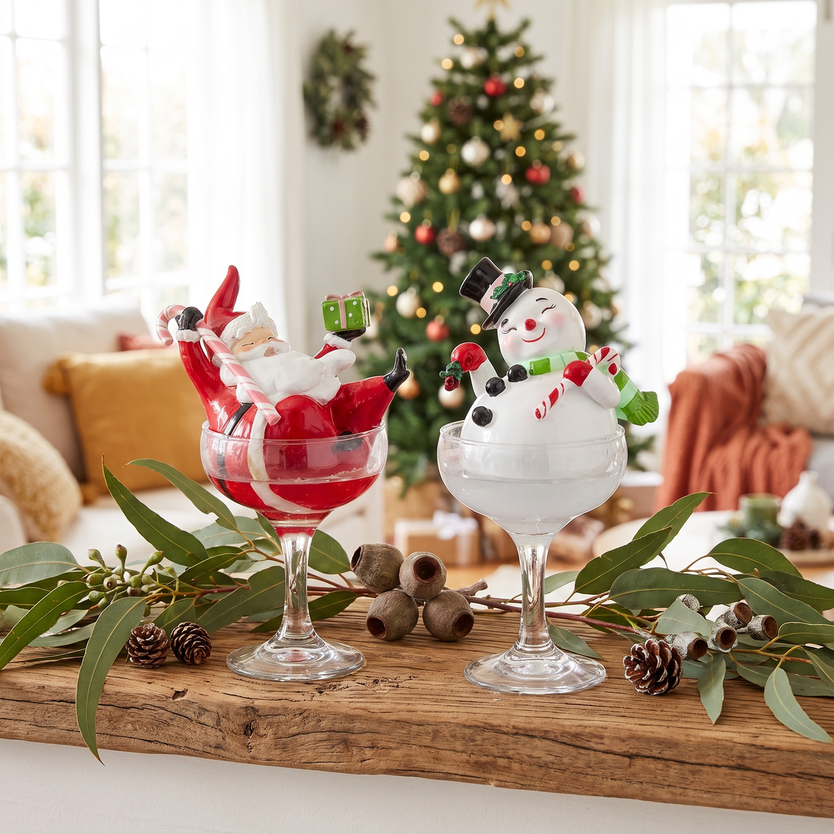 Santa & Snowman in Champagne Glasses Figurines – Set of 2, 19cm – styled in a room