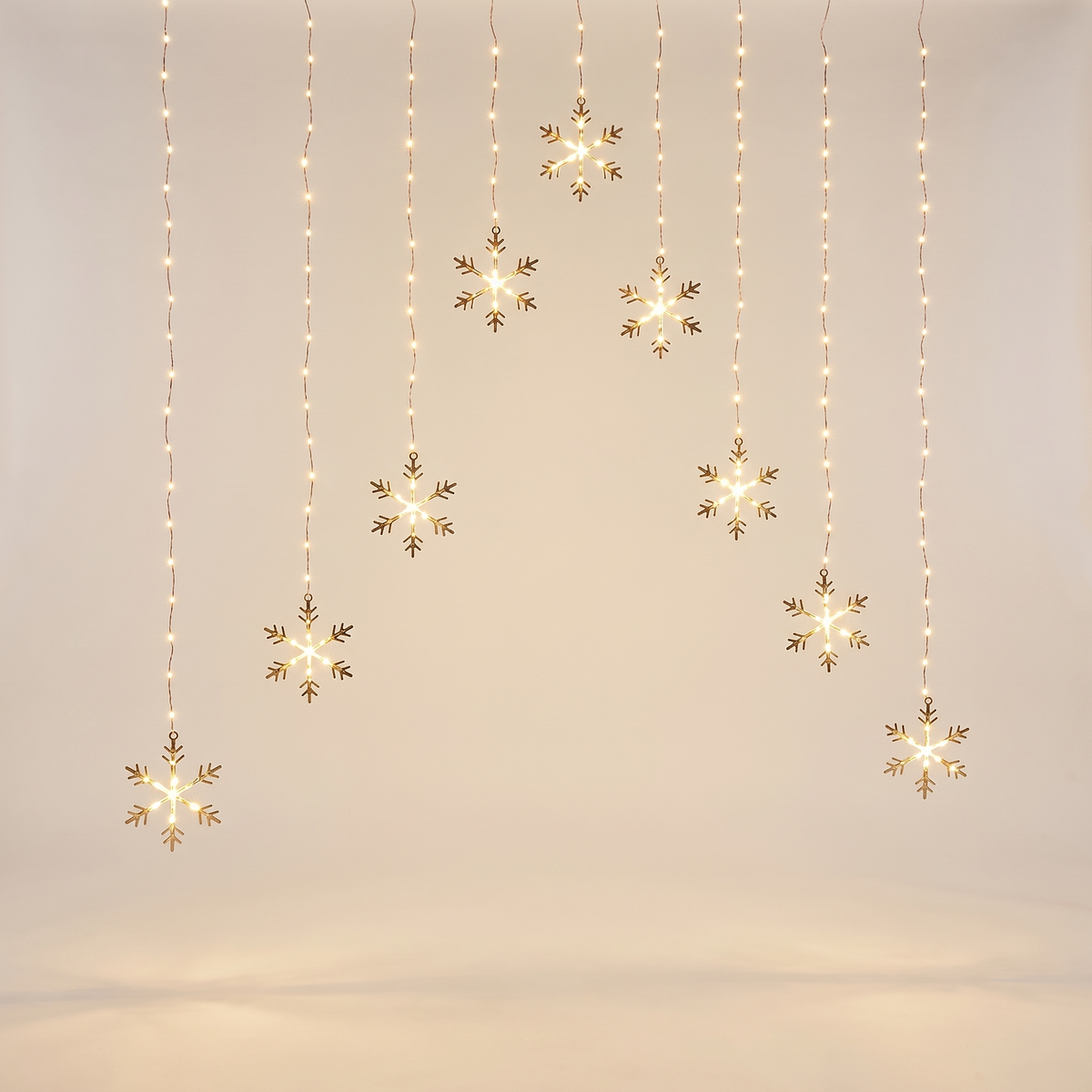 Warm White Snowflake LED Curtain Lights – 1.2m – studio view