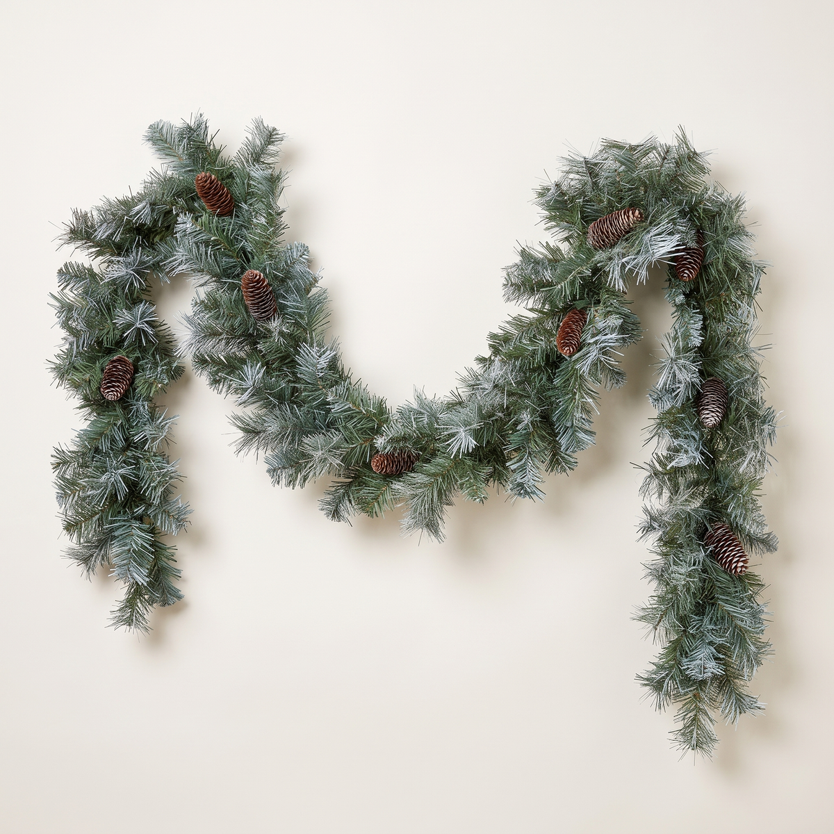 Frosted Blue Spruce Christmas Garland with Pinecones – 2.7m – studio view