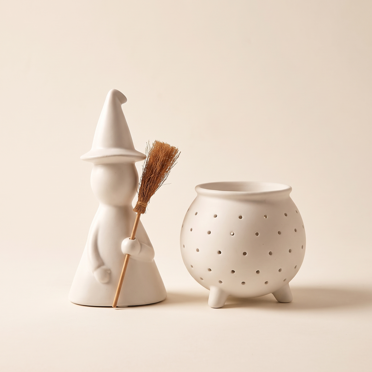 Large Matte White Ceramic Witch with Broom – studio view