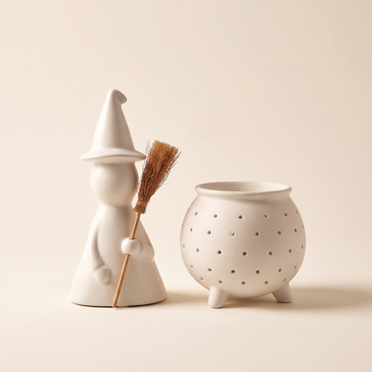 Large Matte White Ceramic Witch with Broom – studio view