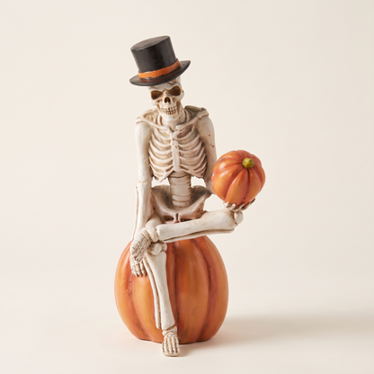 Skeleton Seated on Pumpkin Figurine – 23.5cm Resin Halloween Decor – studio view