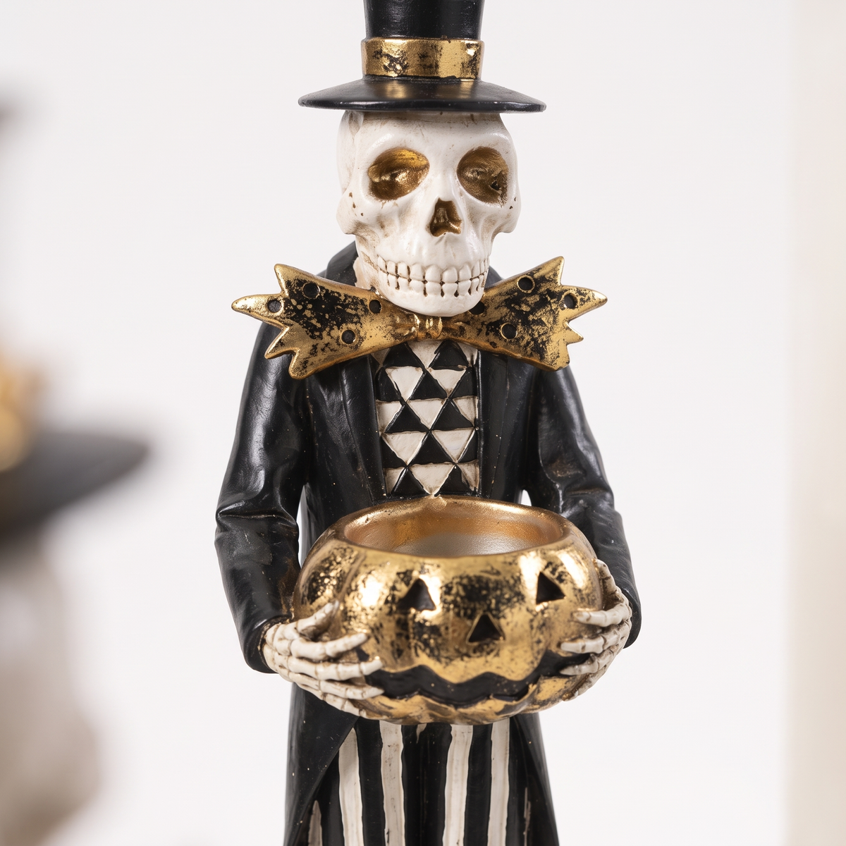 Black & Gold Skeleton with Gilded Jack-o'-Lantern Figurine – 33cm – close-up detail