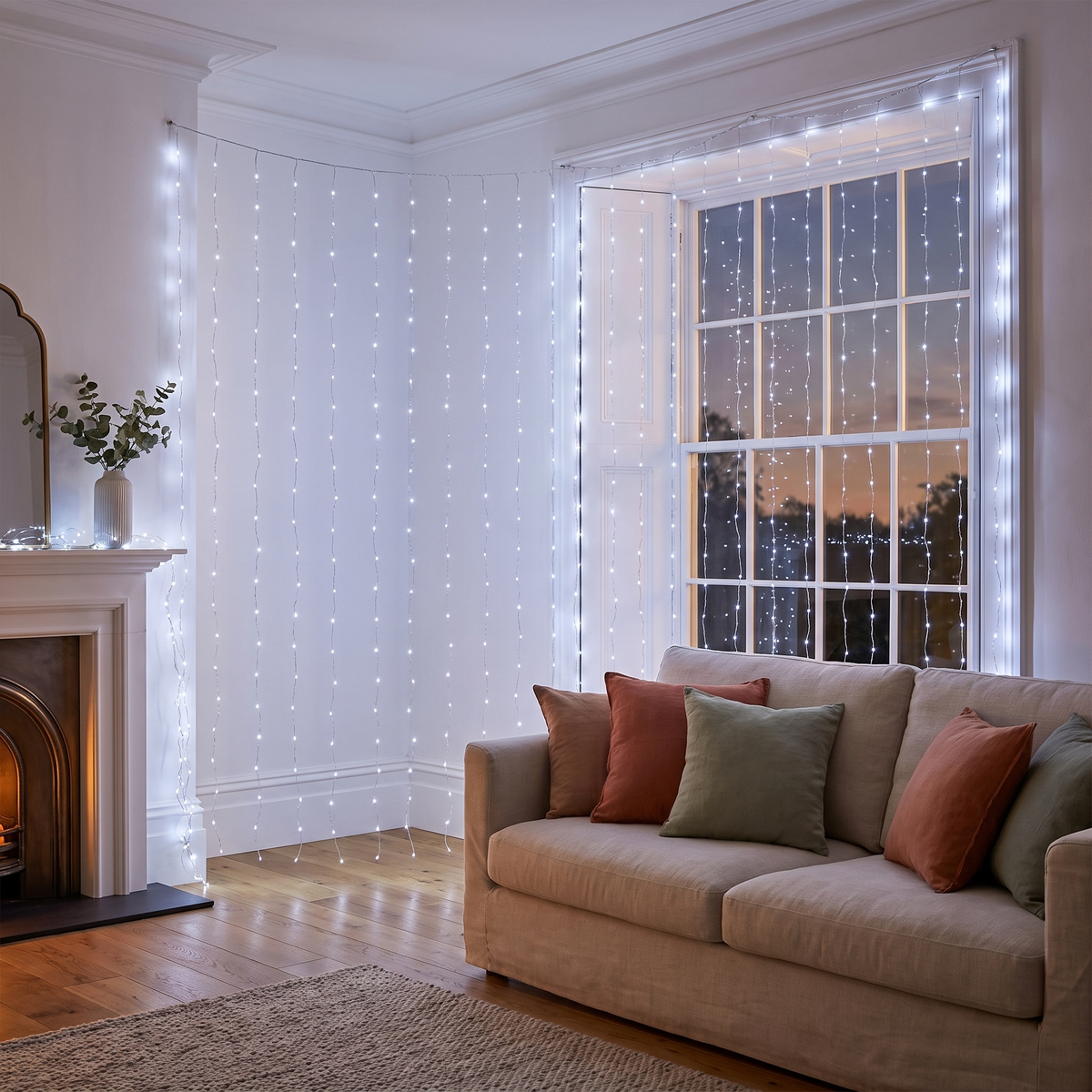 Cool White LED Curtain Christmas Lights – 6m x 3m, 600 LED – styled in a bright living room in the evening