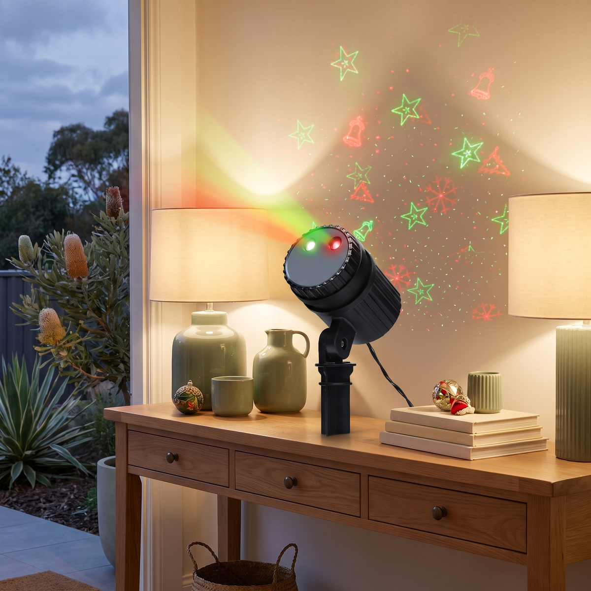 Red & Green Christmas Laser Light Projector – Remote Control – casting red and green lights in a styled entryway at evening