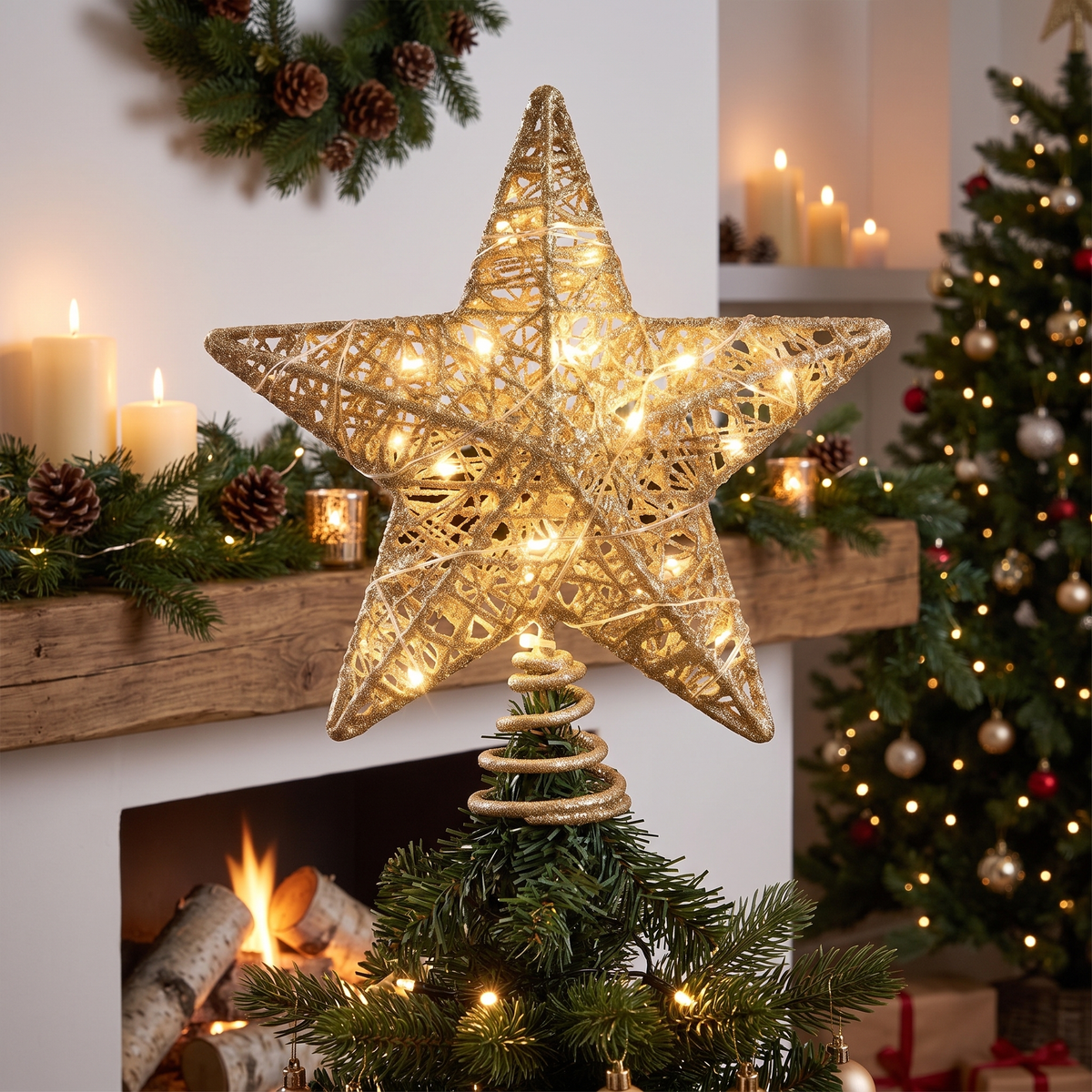 Gold Glitter 3D LED Star Christmas Tree Topper – 23cm, 20 LED – glowing on a Christmas mantel