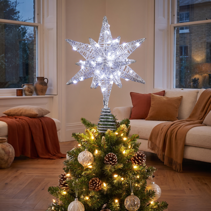 Silver 3D LED Star Christmas Tree Topper – 27cm, 60 LED – glowing in a styled living room at evening