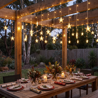 Warm White Star Icicle Christmas Lights – 6m, 160 LED, Solar or Plug – glowing over an alfresco pergola at dusk