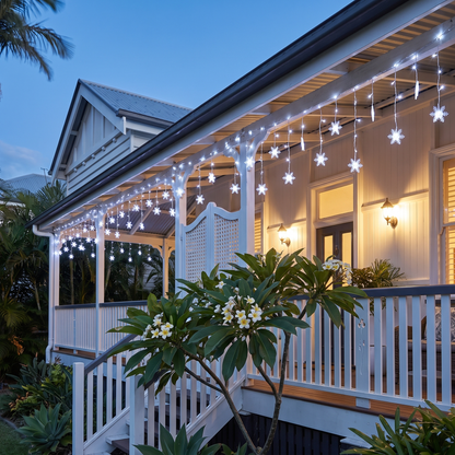 Cool White Snowflake Icicle Christmas Lights – 6m, 160 LED, Solar or Plug – glowing along a Queenslander verandah at dusk