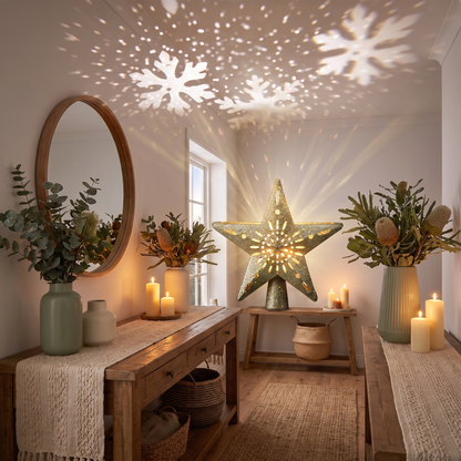 Gold Star Christmas Tree Topper with Snowflake Projector – 26cm – projecting snowflakes in a styled entryway
