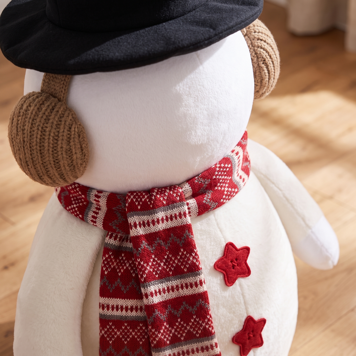 Plush Standing Snowman Christmas Decoration – 60cm – close-up of the knitted earmuffs and scarf