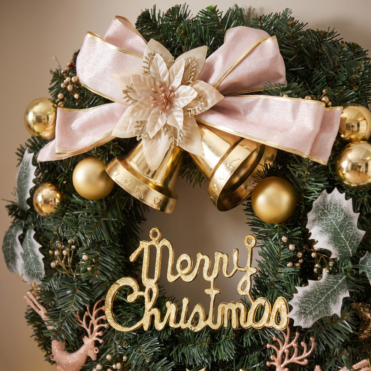 Green Decorated Christmas Wreath with Gold Baubles – 60cm – close-up of the gold baubles, bells and bow